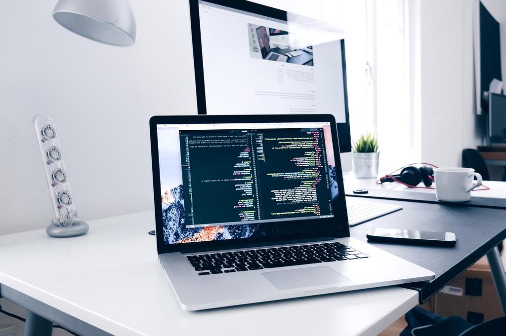 Person setting up a Wi-Fi router using a smartphone